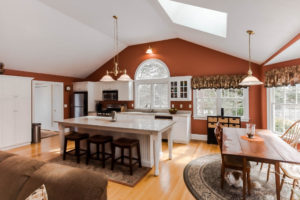 Kitchen and breakfast nook in a 2-story colonial style home in Harwich, MA.