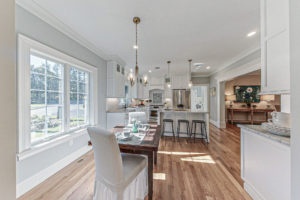 Image of the kitchen in a 2-story colonial style home in East Dennis, MA.