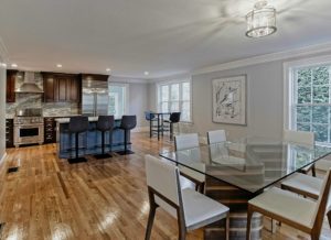 Image of the kitchen and dining in a 2-story colonial style home in Newton, MA.