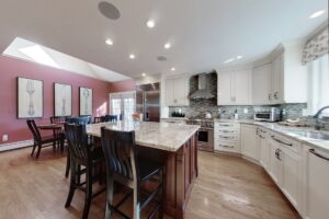 Image of the kitchen in a 2-story colonial style home in North Attleboro, MA.