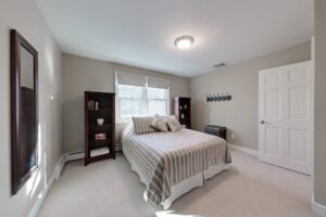 Image of the guest bedroom in a 2-story colonial style home in North Attleboro, MA.