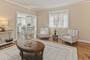 Image of the living room in a 2-story colonial style home in Norton, MA.