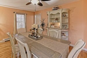 Image of the dining room in a 2-story colonial style home in Rehoboth, MA.