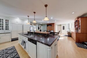 mage of the kitchen in a 3-story colonial style home in North Attleborough, MA.
